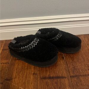 UGG Black Fuzzy Slippers with Stitch Detail